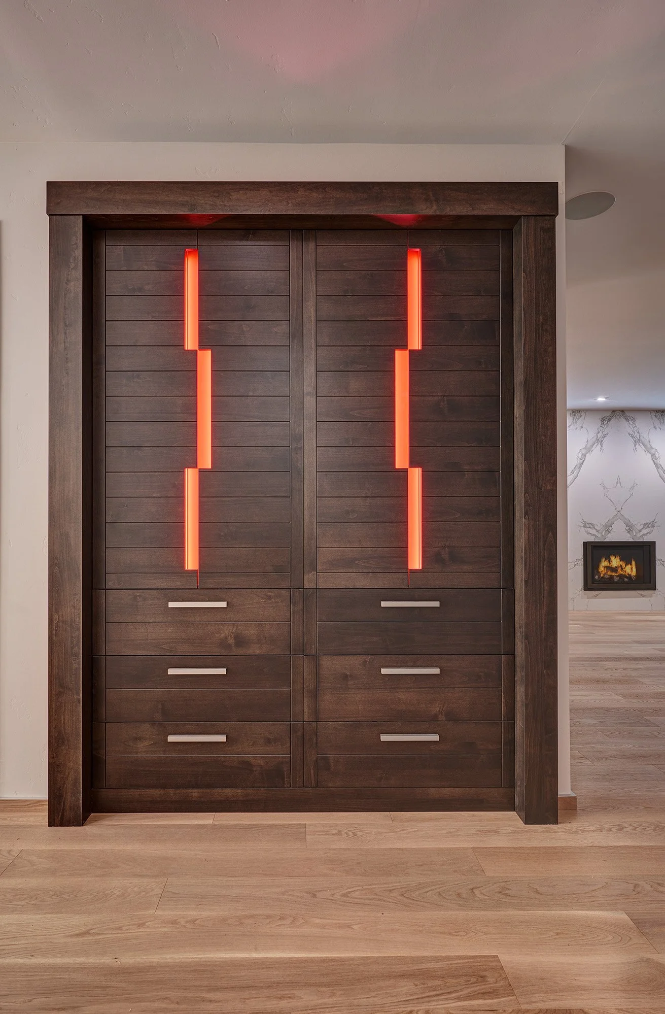 Modern whole home remodel, European cabinetry linen closet, lit openings in doors