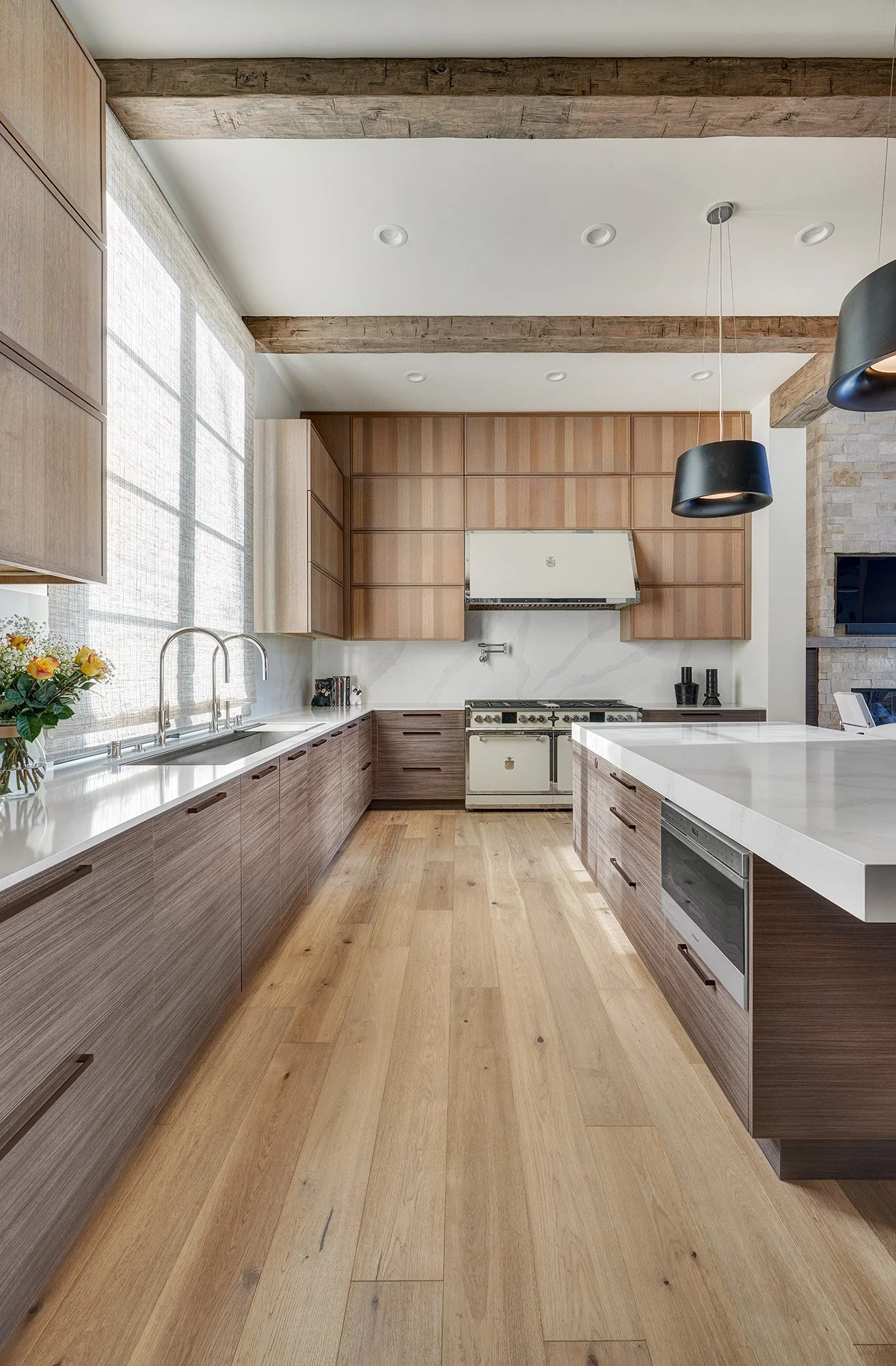 Modern new construction home, kitchen, large seating island, tall appliance wall, laminate and white oak cabinetry, The Galley workstation