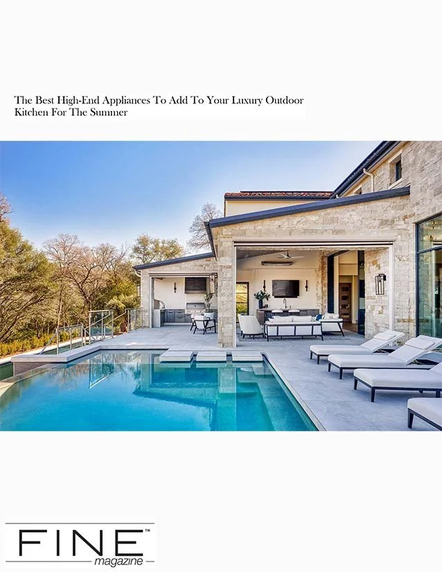 Outdoor luxury kitchen with swimming pool, lounge chairs, outdoor kitchen and seating area in backyard of modern home.