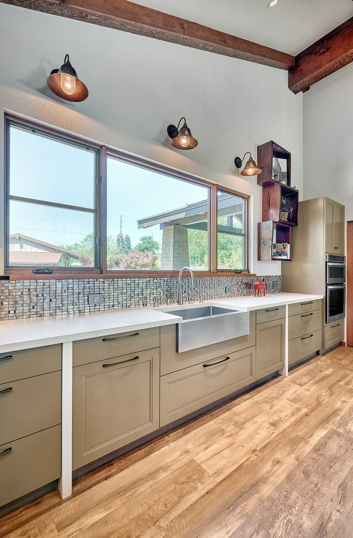 Vaulted ceiling kitchen remodel, beams, large seating island, cabinetry