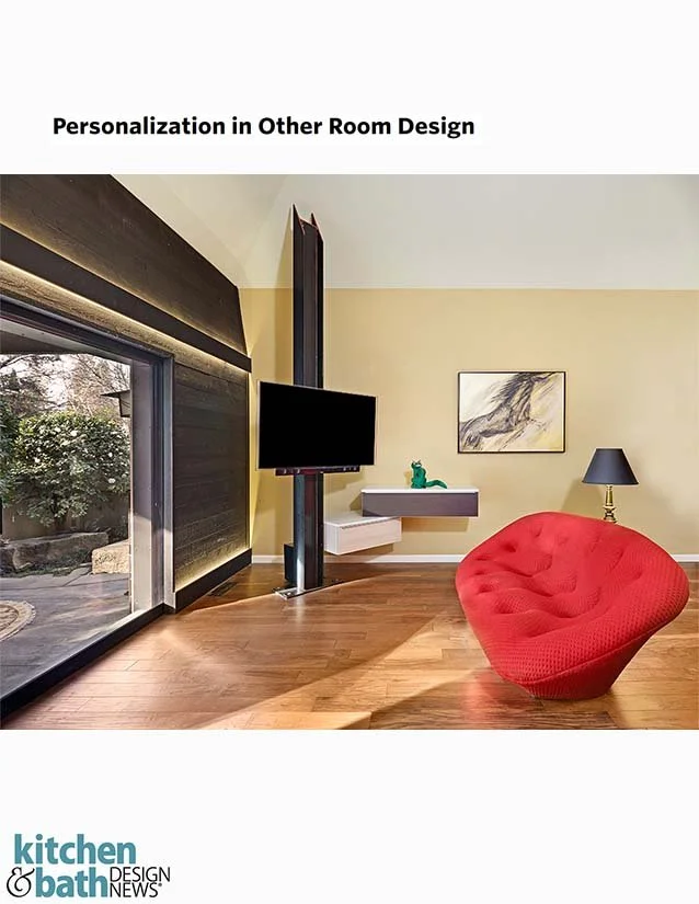 Modern interior living room with a large window, black TV mounted on a black post, abstract artwork, a navy blue table lamp, and a red modern lounge chair.
