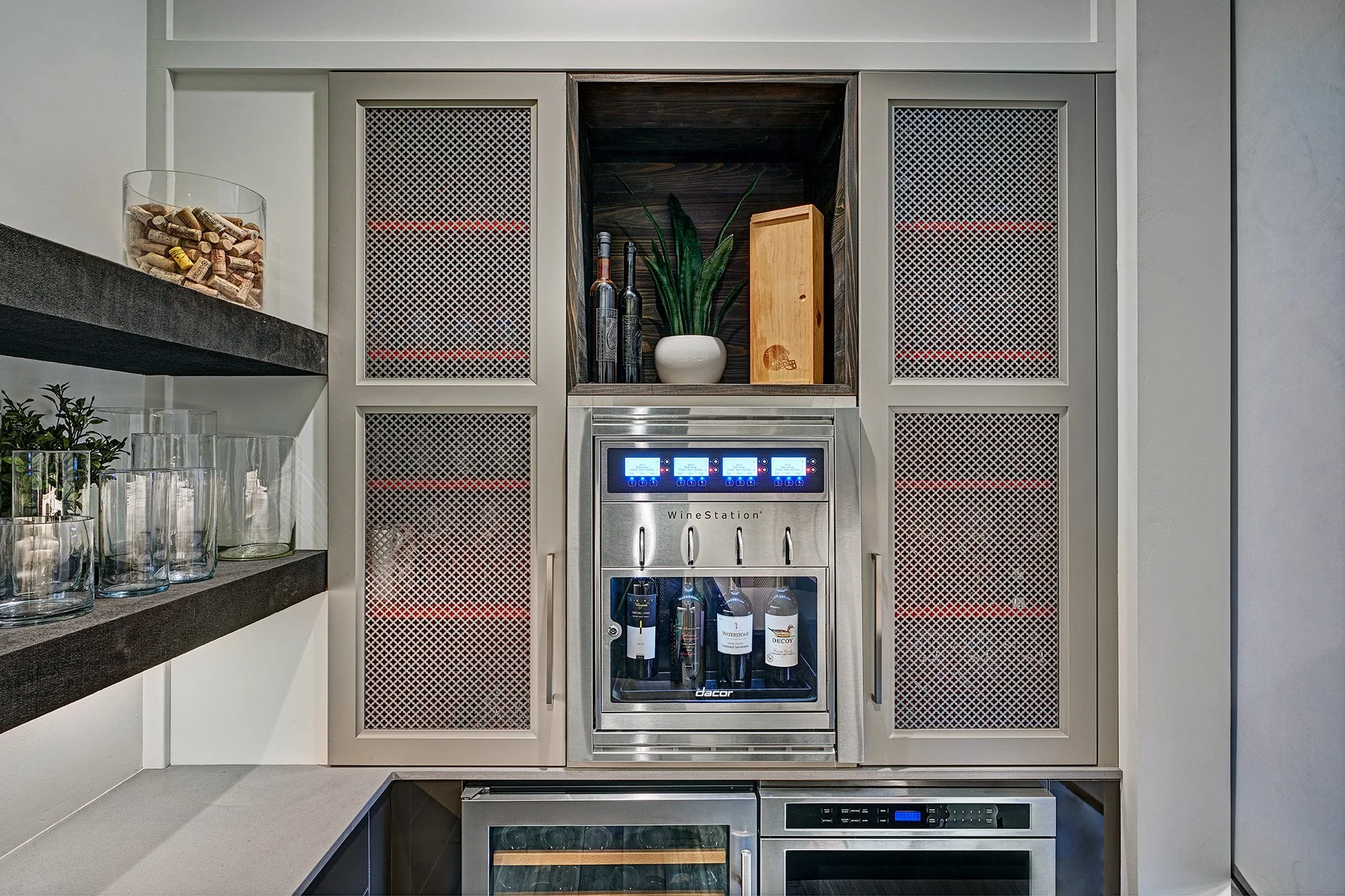 Luxury new construction home, custom bar, metal mesh cabinets, cabinet floating shelves