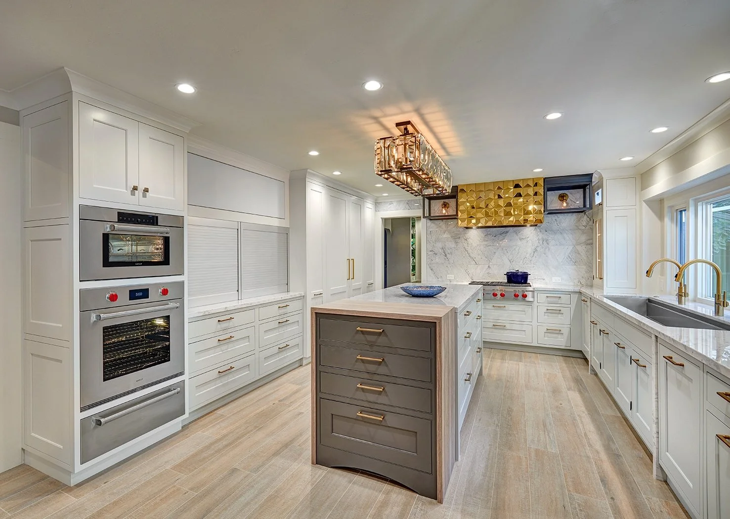 Whole home remodel, glamorous kitchen, white cabinetry, Wolf appliances, appliance garage, large island, The Galley workstation