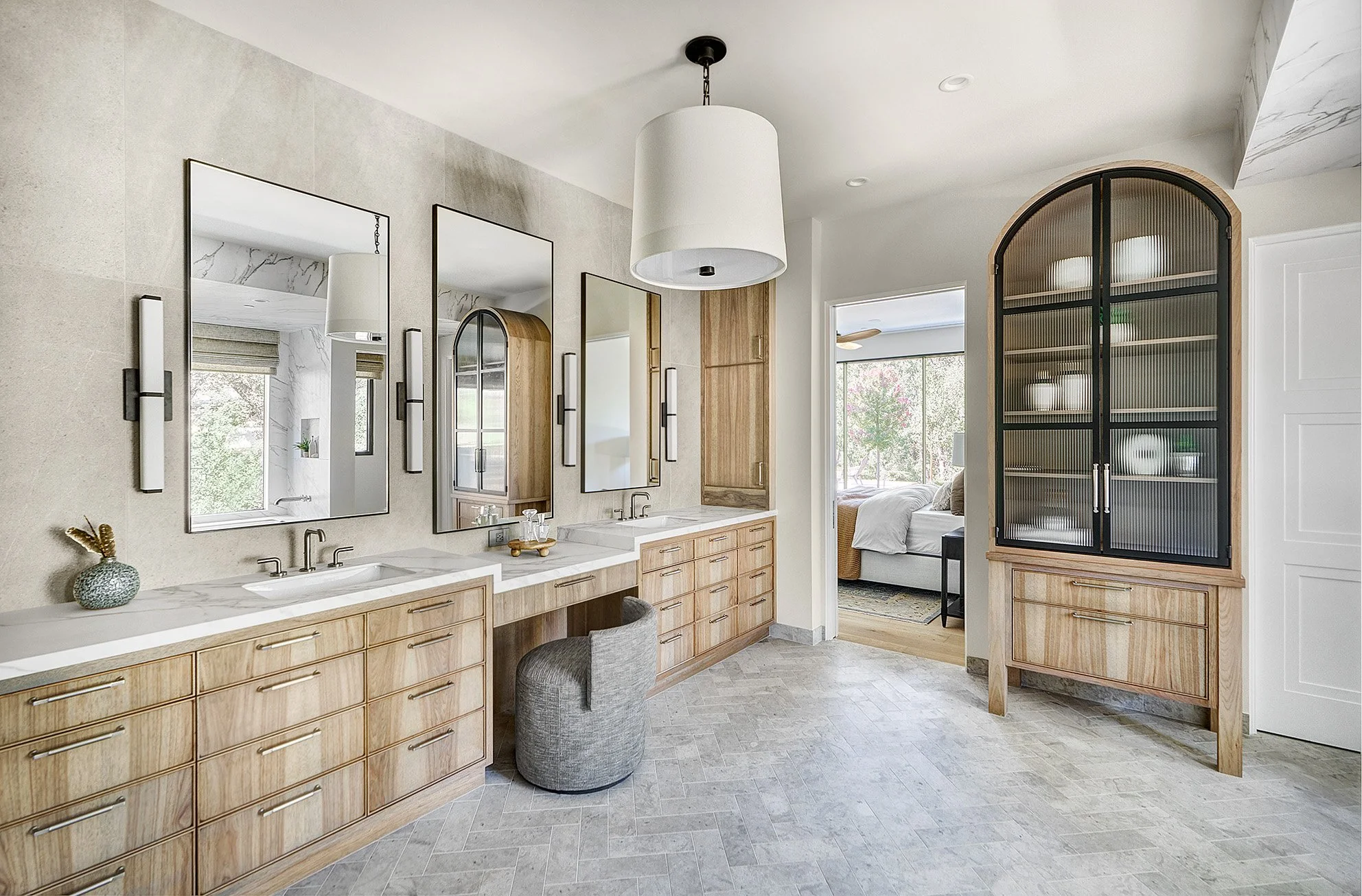 Custom hickory cabinetry, arched display glass front cabinet, primary bathroom, double vanity