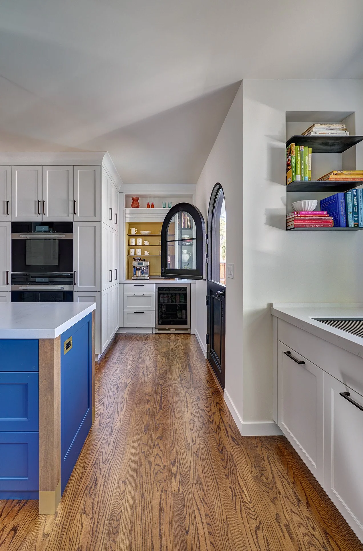 1930s kitchen remodel, white, blue + wood cabinetry, The Galley workstation, floating metal shelves, appliance garage