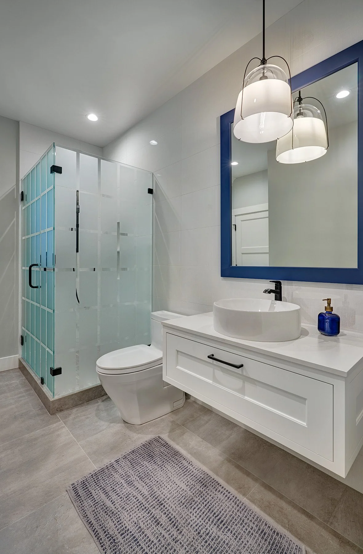 Home remodel, guest bath, floating cabinet vanity, etched glass shower