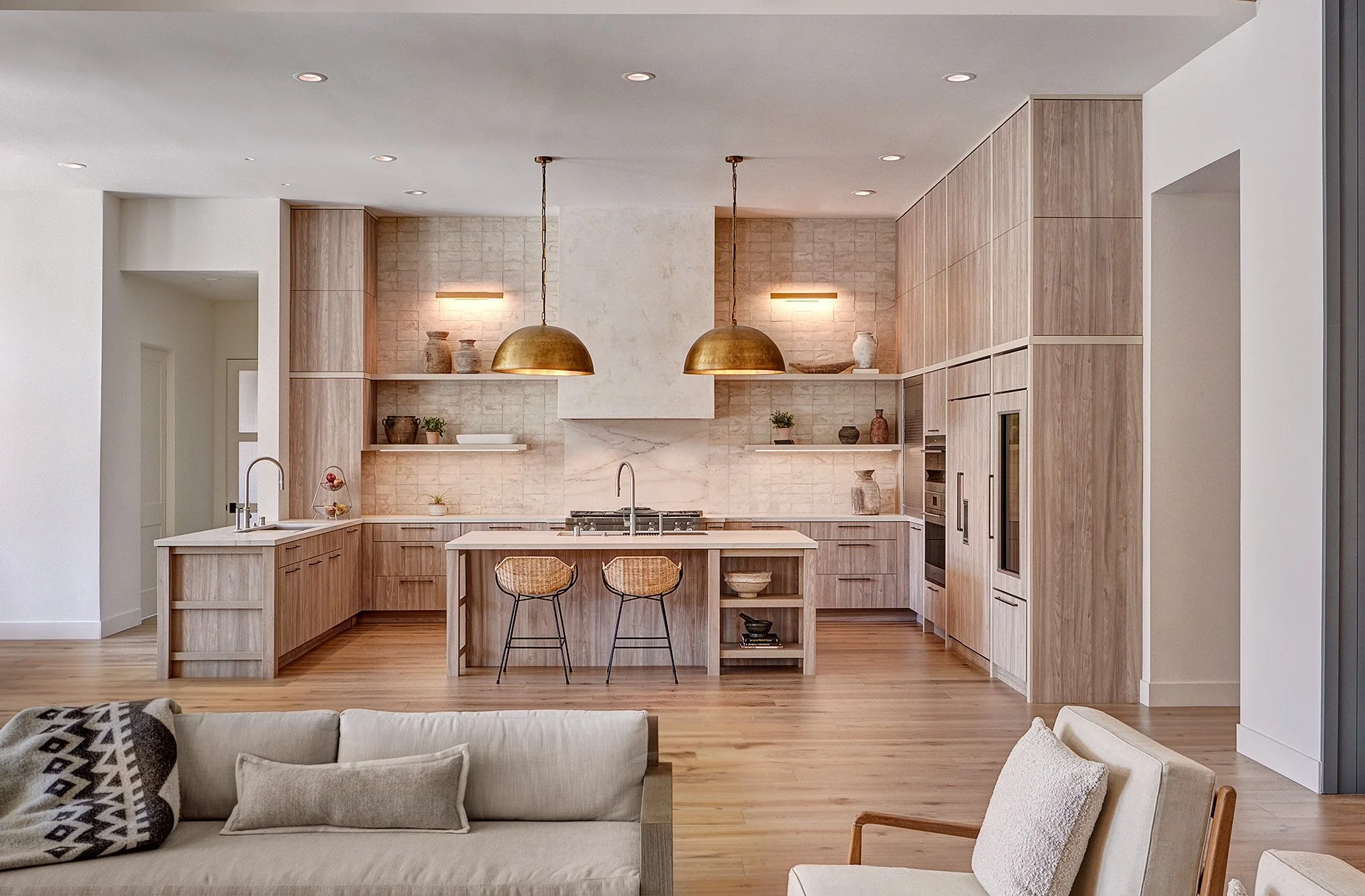 Warm modern new construction home, kitchen, European laminate cabinetry, The Galley workstation, Sub-Zero + Wolf appliances