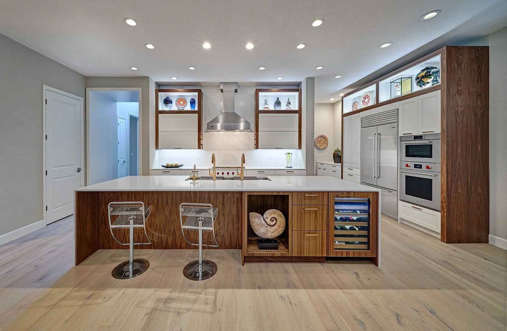 Modern kitchen remodel, white + walnut cabinetry, large seating island, workstation sink