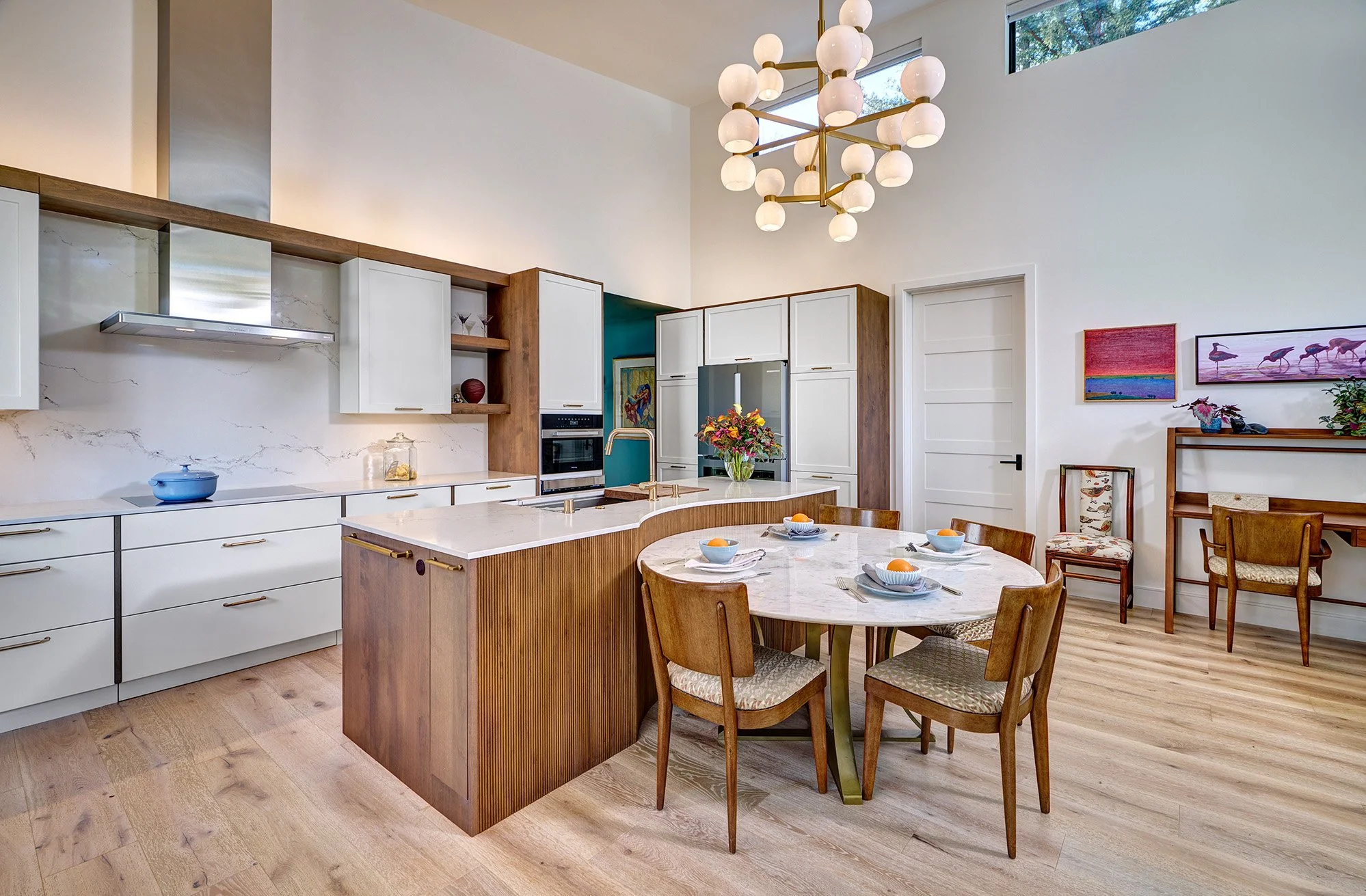 New construction ADU home, white + wood kitchen, curved ribbed island, appliance garage