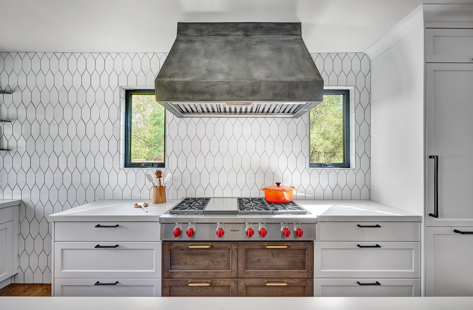 1930s kitchen remodel, white, blue + wood cabinetry, Wolf rangetop, plaster hood
